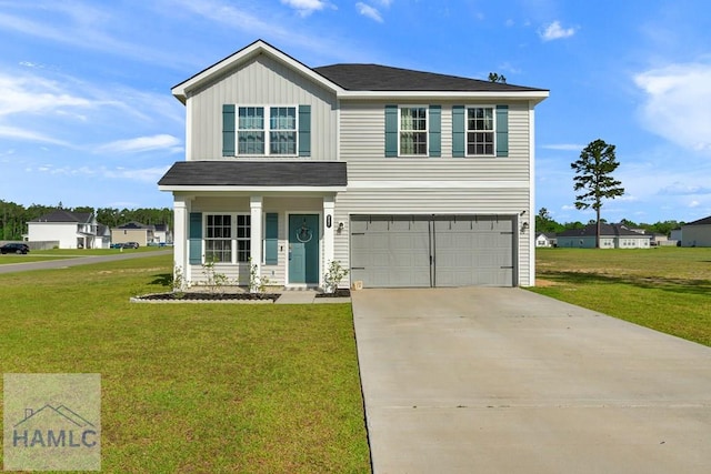 247 Morgan Field Blvd, Ludowici, GA 31316 - traditional home featuring an attached garage, a front lawn, concrete driveway, and covered porch