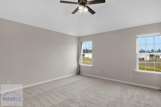247 Morgan Field Blvd, Ludowici, GA 31316 - unfurnished room with light carpet, a ceiling fan, baseboards, and high vaulted ceiling