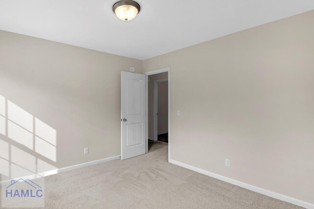 247 Morgan Field Blvd, Ludowici, GA 31316 - carpeted empty room with baseboards