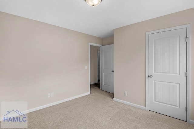 247 Morgan Field Blvd, Ludowici, GA 31316 - unfurnished bedroom with light carpet and baseboards