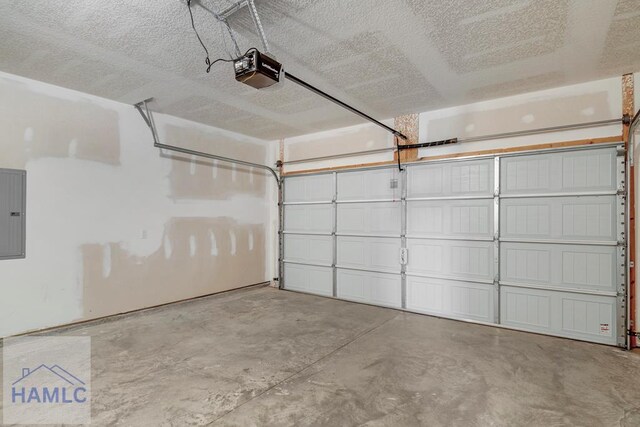 247 Morgan Field Blvd, Ludowici, GA 31316 - garage featuring a garage door opener and electric panel