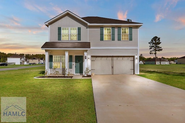 247 Morgan Field Blvd, Ludowici, GA 31316 - traditional-style home with a garage, a front lawn, concrete driveway, and covered porch