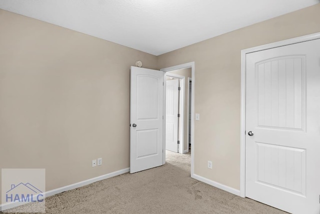 247 Morgan Field Blvd, Ludowici, GA 31316 - unfurnished bedroom with light colored carpet and baseboards
