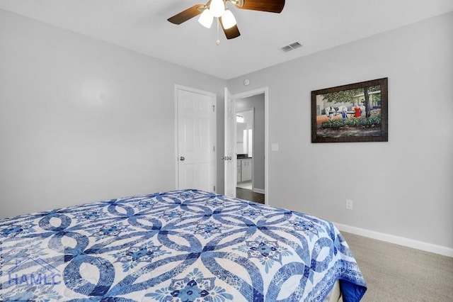 carpeted bedroom with ceiling fan