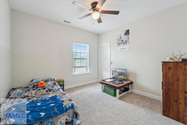 91 Thomas Way SE, Ludowici, GA 31316 - carpeted bedroom with baseboards and a ceiling fan