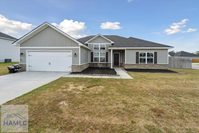 91 Thomas Way SE, Ludowici, GA 31316 - view of front of house with an attached garage, concrete driveway, stone siding, and board and batten siding