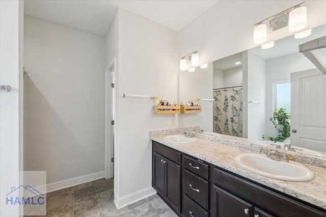 91 Thomas Way SE, Ludowici, GA 31316 - full bathroom featuring double vanity and curtained shower