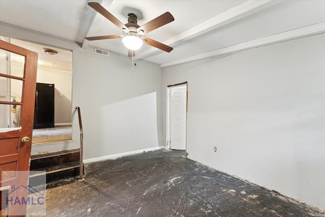 unfurnished room featuring ceiling fan and beamed ceiling