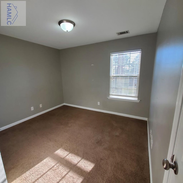 view of carpeted spare room