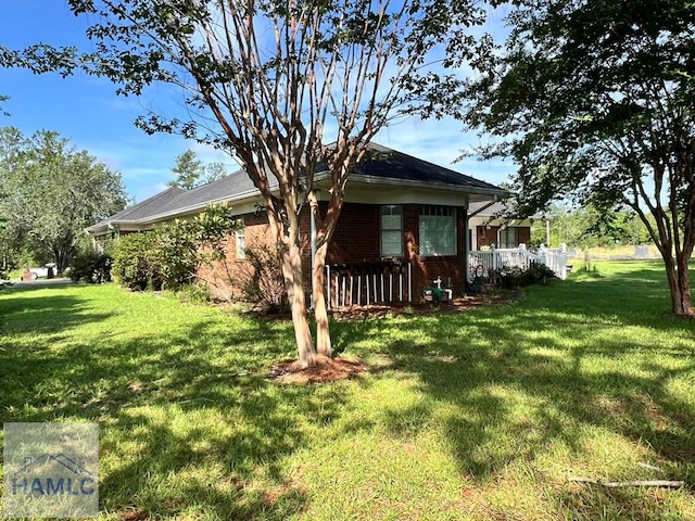 exterior space with a lawn