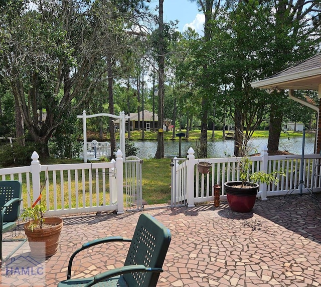 view of patio / terrace featuring a water view