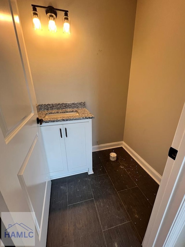 556 Caleb Cir, Jesup, GA 31545 - bathroom with baseboards and vanity