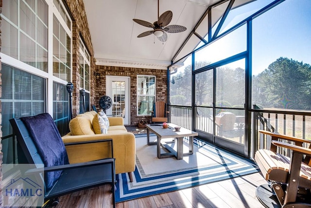 sunroom / solarium featuring vaulted ceiling and ceiling fan