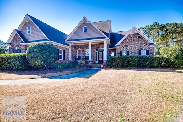 craftsman house with a front yard