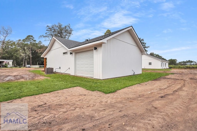 view of home's exterior with central AC and a lawn