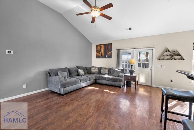 living room with high vaulted ceiling, dark hardwood / wood-style floors, and ceiling fan