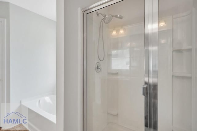 89 Morgan Field Blvd, Ludowici, GA 31316 - bathroom featuring a stall shower and a garden tub