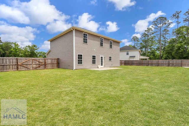 89 Morgan Field Blvd, Ludowici, GA 31316 - back of house featuring a patio