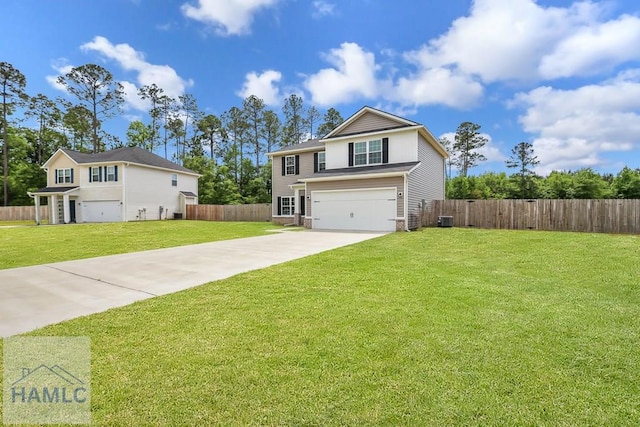 89 Morgan Field Blvd, Ludowici, GA 31316 - traditional-style home with a garage, concrete driveway, and central AC