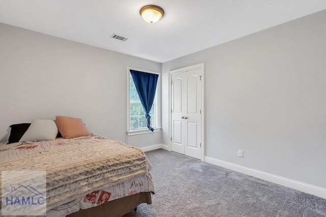 243 Forest St, Ludowici, GA 31316 - bedroom with visible vents, carpet flooring, and baseboards