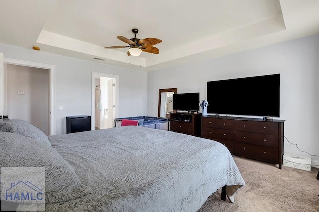 243 Forest St, Ludowici, GA 31316 - bedroom featuring light colored carpet, a ceiling fan, visible vents, and a raised ceiling