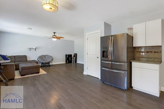 243 Forest St, Ludowici, GA 31316 - kitchen featuring stainless steel refrigerator with ice dispenser, white cabinetry, ceiling fan, and dark wood finished floors