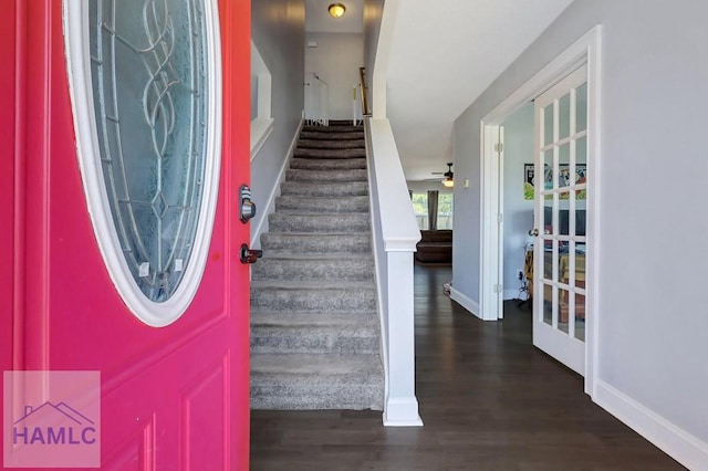 243 Forest St, Ludowici, GA 31316 - foyer with baseboards, ceiling fan, stairs, and wood finished floors