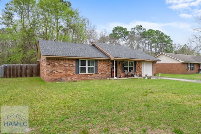 124 Deann Dr, Hinesville, GA 31313 - ranch-style home featuring an attached garage, brick siding, concrete driveway, and roof with shingles