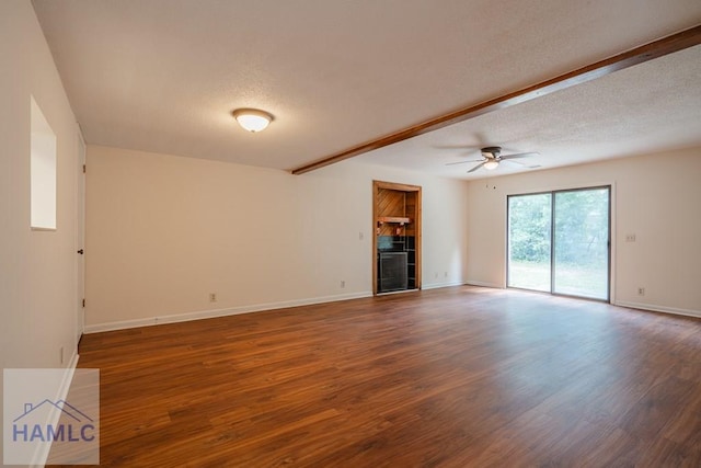 727S Main St Unit 121, Hinesville, GA 31313 - unfurnished living room featuring ceiling fan, a textured ceiling, wood finished floors, and a tiled fireplace