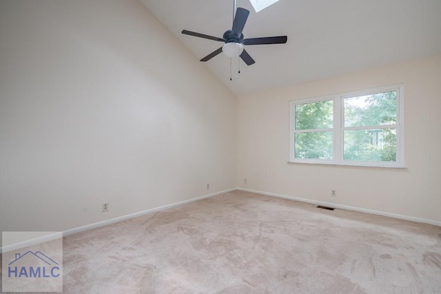 727S Main St Unit 121, Hinesville, GA 31313 - unfurnished room featuring vaulted ceiling, light carpet, ceiling fan, and a skylight