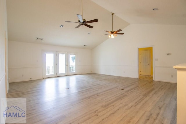 spare room featuring high vaulted ceiling, light hardwood / wood-style flooring, and ceiling fan