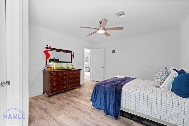 550 Brogdon Rd, Guyton, GA 31312 - bedroom with wood finished floors, crown molding, ceiling fan, and baseboards