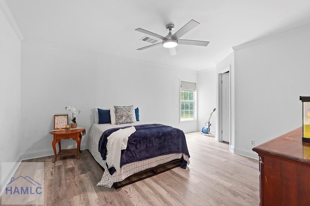 550 Brogdon Rd, Guyton, GA 31312 - bedroom with crown molding, light wood-type flooring, baseboards, and ceiling fan