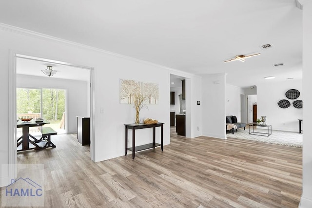 550 Brogdon Rd, Guyton, GA 31312 - living room with wood finished floors, crown molding, and baseboards
