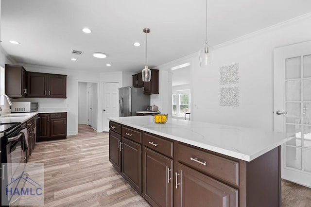550 Brogdon Rd, Guyton, GA 31312 - kitchen featuring stainless steel refrigerator with ice dispenser, light wood-style flooring, crown molding, dark brown cabinets, and recessed lighting
