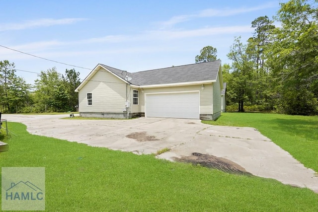 550 Brogdon Rd, Guyton, GA 31312 - view of home's exterior with an attached garage, concrete driveway, and a lawn