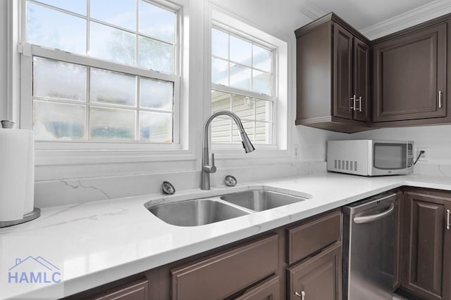 550 Brogdon Rd, Guyton, GA 31312 - kitchen featuring appliances with stainless steel finishes, a sink, and dark brown cabinets