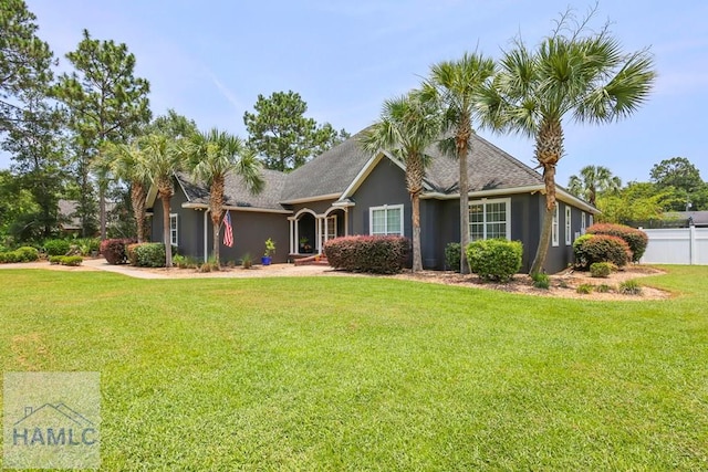 645 Littlefield St, Jesup, GA 31546 - ranch-style home featuring stucco siding