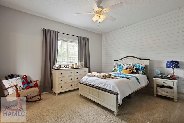 645 Littlefield St, Jesup, GA 31546 - bedroom with light carpet, a textured ceiling, and a ceiling fan
