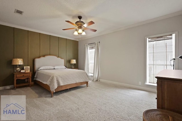 645 Littlefield St, Jesup, GA 31546 - bedroom with ornamental molding, light carpet, and a ceiling fan