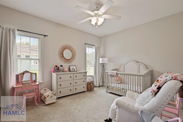645 Littlefield St, Jesup, GA 31546 - carpeted bedroom featuring multiple windows and ceiling fan