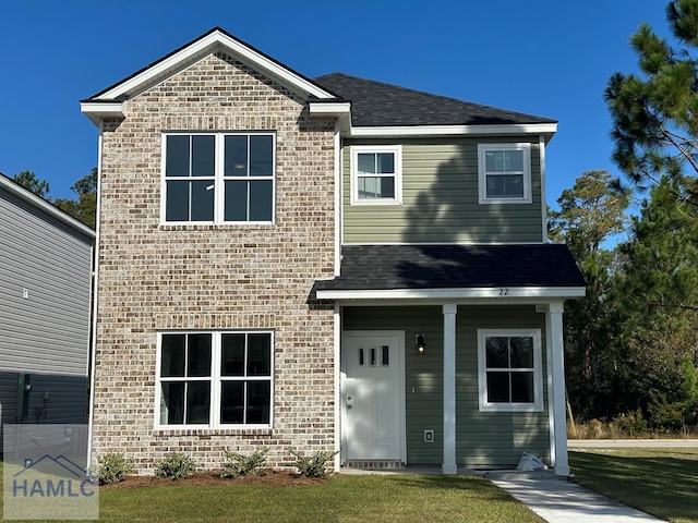 view of front of home with a front lawn