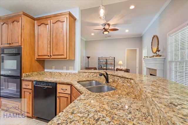190 Sandpiper Rd, Midway, GA 31320 - kitchen with black appliances, a sink, light stone counters, ceiling fan, and recessed lighting
