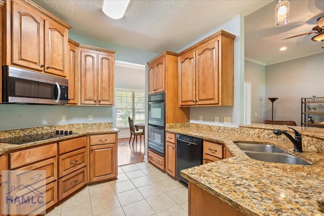 190 Sandpiper Rd, Midway, GA 31320 - kitchen featuring black appliances, a sink, light stone counters, ceiling fan, and light tile patterned flooring