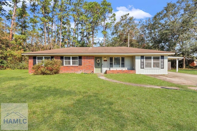 ranch-style home with a front yard and a carport