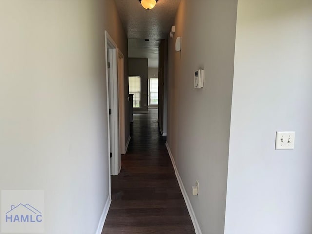 401 Barry Mccaffrey Blvd Unit B4, Hinesville, GA 31313 - hall featuring baseboards and dark wood-type flooring