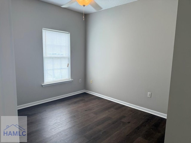 401 Barry Mccaffrey Blvd Unit B4, Hinesville, GA 31313 - empty room with a ceiling fan and dark wood-style floors