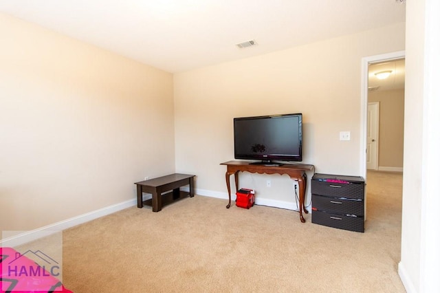 game room with light colored carpet