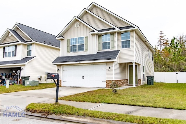 craftsman-style home with a garage and a front lawn