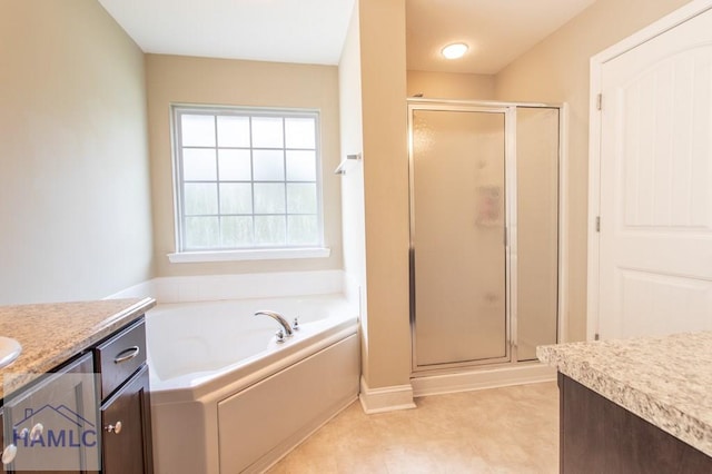 bathroom featuring vanity and plus walk in shower